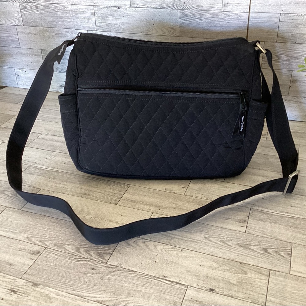 Vera Bradley | Black Quilted Crossbody with floral pattern inside